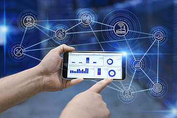 A cellphone with a dashboard from Leadec.os with light effects. 