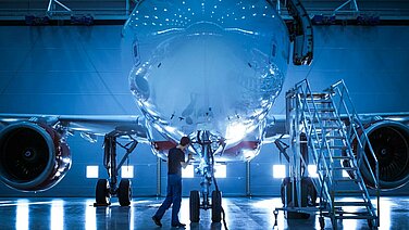 Airplane in a production hall.